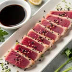 Seared Peppered Ahi Tuna Outback 3 Seared peppered ahi tuna Outback style on plate