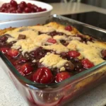 chocolate cherry dump cake served hot