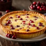 Slice of cranberry custard pie with tart cranberries