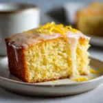 Slice of moist lemon cake with glaze