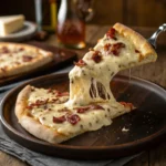 Bacon Alfredo Pizza – Ultimate Comfort Food for Pizza Lovers 12 Slice of Bacon Alfredo Pizza with crispy bacon