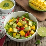 Easy Mango Avocado Salad Recipe – Fresh, Healthy & Family-Friendly 9 Mango avocado salad in a white bowl